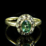 Rozetta fazonú női arany gyűrű smaragddal és gyémánt kövekkel