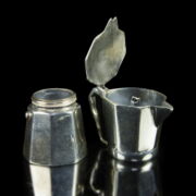 Mini ezüst kotyogó - vitrintárgy