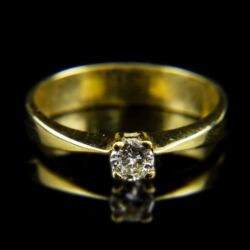 Picture 2/2 -14 K gold engagement ring with a diamond in the 4-prong setting (0.18 ct)