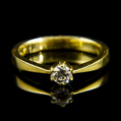 Picture 2/2 -18 K gold engagement ring with a brilliant-cut diamond (0.22 ct)