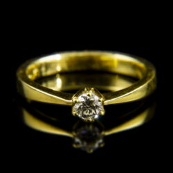 Picture 2/2 -18 K gold engagement ring with a brilliant-cut diamond (0.22 ct)
