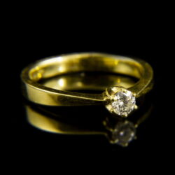 Picture 1/2 -18 K gold engagement ring with a brilliant-cut diamond (0.22 ct)