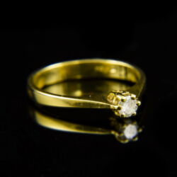 Picture 1/2 -18 K gold engagement ring with a diamond (0.16 ct)