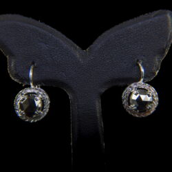 Picture 4/4 -A pair of gold earrings with a leverback closure and black diamonds