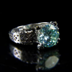 Picture 1/2 -Solitaire ring with blue moissanite stone