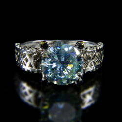 Picture 2/2 -Solitaire ring with blue moissanite stone