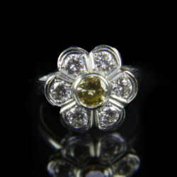 Picture 2/2 -14 K rosetta style white gold and diamond ring