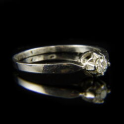 Picture 1/2 -14 K white gold solitaire ring with a brilliant-cut diamond (0.15 ct)