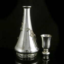 Picture 2/4 -Silver liquor bottle with a small glass