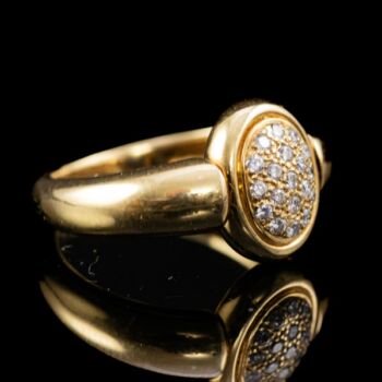 Arany gyűrű gyémántokkal illetve zafírral  ékített átfordítható gyűrűfejjel