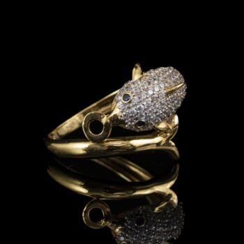 Gold ring in the shape of a dolphin, studded with zirconias