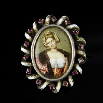 Brooch with a portrait in an enameled silver frame