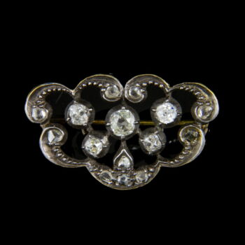 Golden brooch with diamonds