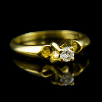 18 karátos sárgaarany eljegyzési gyűrű briliáns csiszolású gyémánt kővel (0.16 ct)