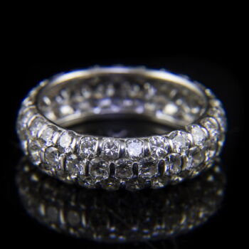White gold ring with three rows of diamonds