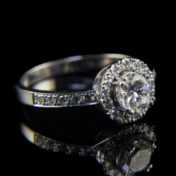 Solitaire-style ring with diamonds