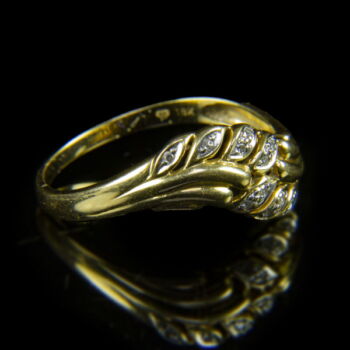 Arany gyűrű achtkant csiszolású gyémánt kövekkel