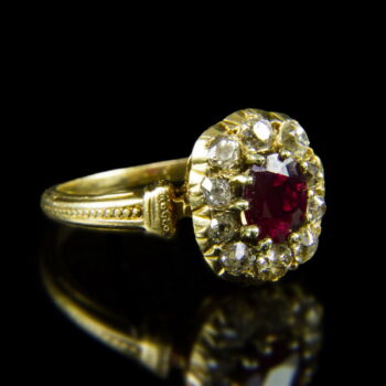 Rubin és gyémánt köves rozetta fazonú arany gyűrű