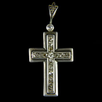 Cross pendant with a diamond