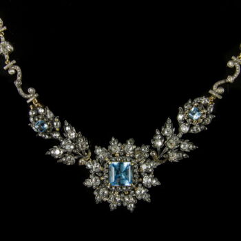 Golden necklace with diamonds and topazes