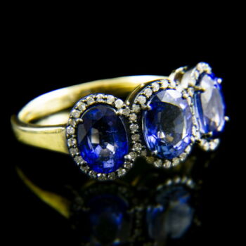 Alliance-style sapphire and diamond ring ​