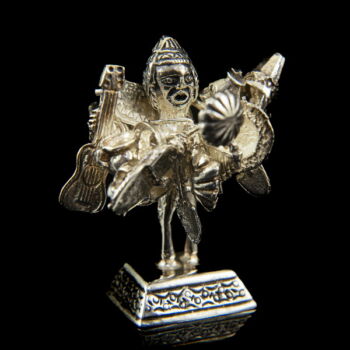 Mini ezüst ószeres férfi figura