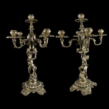 Pair of neo-baroque five-pronged silver candelabra