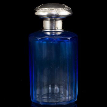Perfume bottle with silver cap