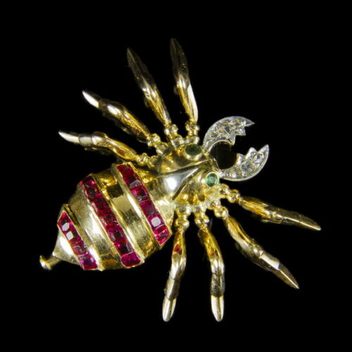 Golden scarab beetle brooch