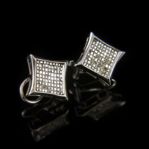 14 K white gold pair of earrings with small diamonds