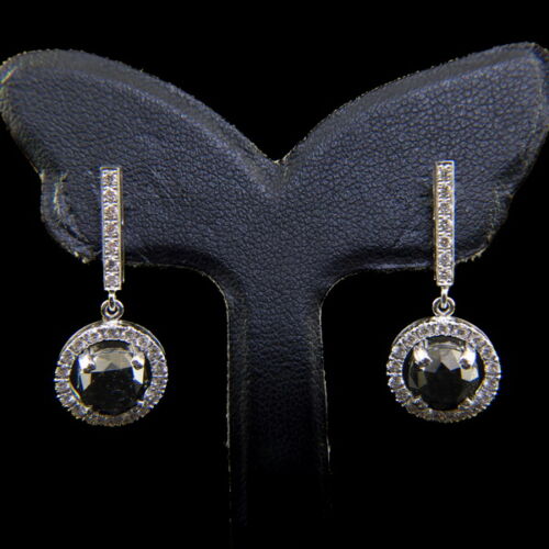 A pair of stud earrings with brilliant-cut black diamonds