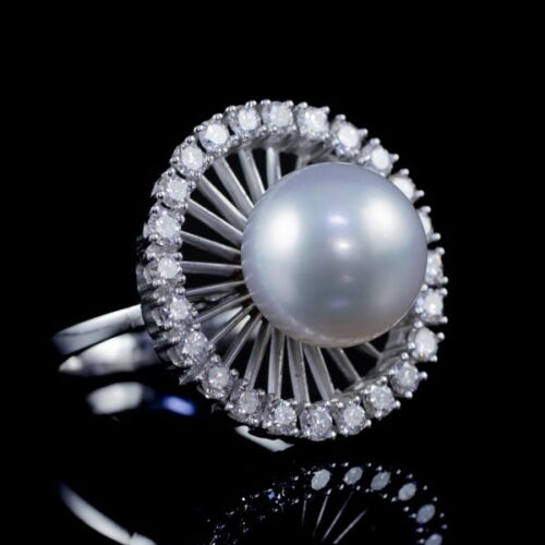 White gold ring with pearls and diamonds
