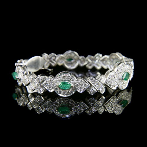 Art deco gold bracelet with emeralds and diamonds