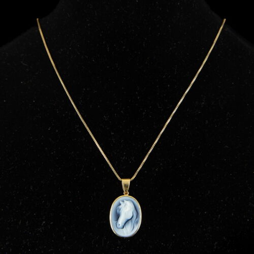 Blue agate cameo with a horse's head hanging on a gold chain