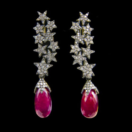 Pair of ruby earrings with diamond stars