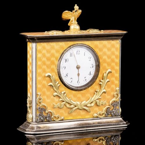 Silver-cased table clock with peach blossom-colored luster enamel