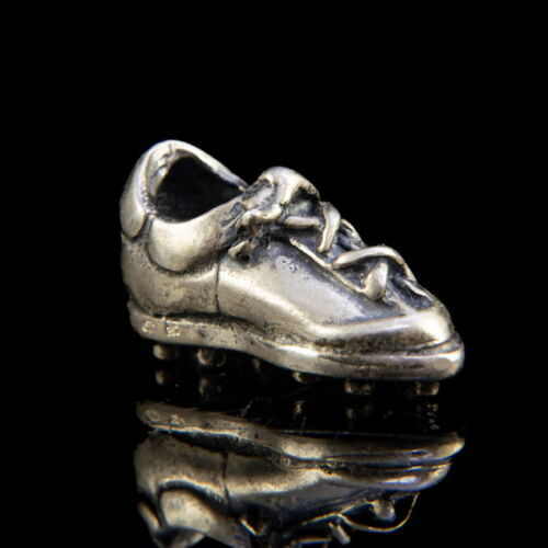 Mini silver cleat shoes