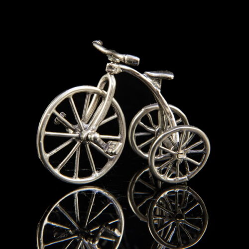 Silver tricycle