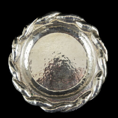 Round silver tray with punched decoration