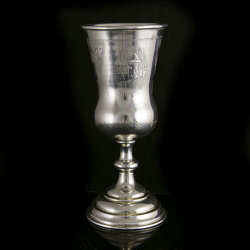 Silver cup with engraved decoration and base