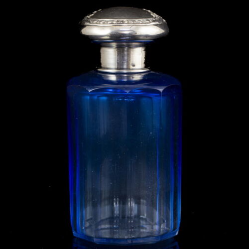 Perfume bottle with silver cap