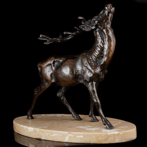 Bronz szarvas figura