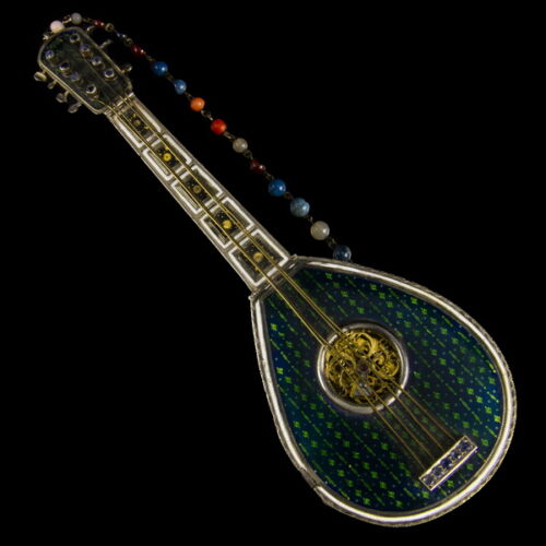 Buzuki-shaped musical instrument clock with an enamel decoration