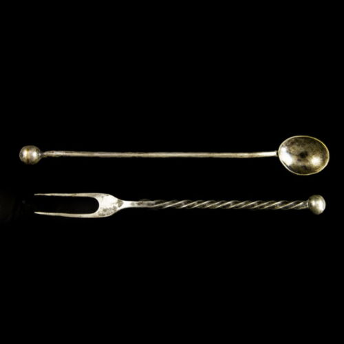 Caviar picking teaspoon and anchovy fork